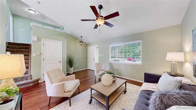 4164 E 135th Pl, Thornton, CO 80241 - living room with lofted ceiling, ceiling fan, stairs, and wood finished floors