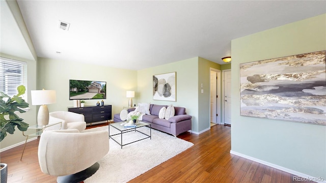 4164 E 135th Pl, Thornton, CO 80241 - living area featuring hardwood / wood-style floors and baseboards