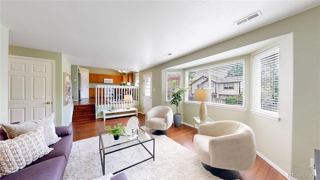 4164 E 135th Pl, Thornton, CO 80241 - living room with wood finished floors and stairs