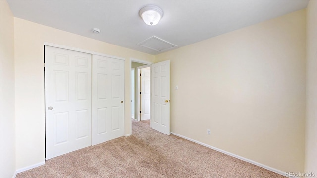 4164 E 135th Pl, Thornton, CO 80241 - unfurnished bedroom featuring carpet floors, attic access, and a closet