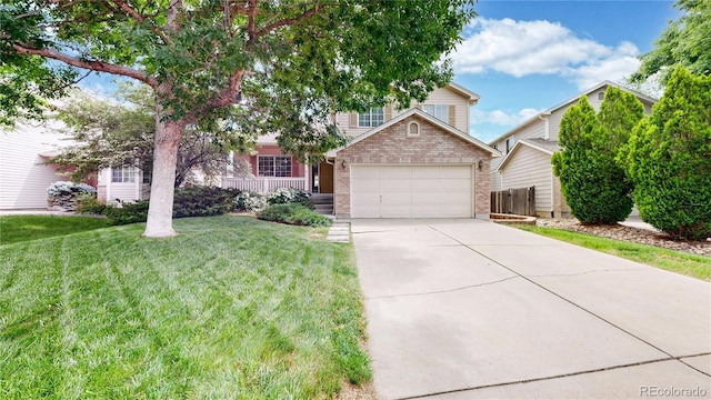4164 E 135th Pl, Thornton, CO 80241 - obstructed view of property with brick siding, a garage, and driveway