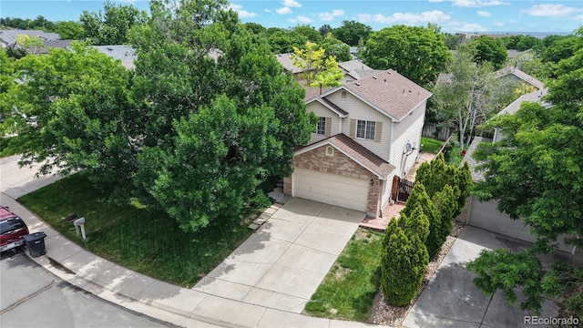 4164 E 135th Pl, Thornton, CO 80241 - view of subject property featuring a tree filled landscape