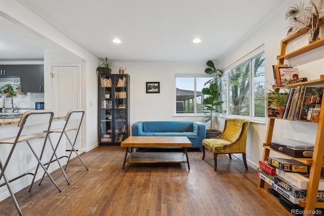 2870 Pontiac St, Denver, CO 80207 - sitting room featuring wood finished floors, recessed lighting, and baseboards