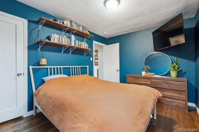 2870 Pontiac St, Denver, CO 80207 - bedroom featuring wood finished floors and baseboards