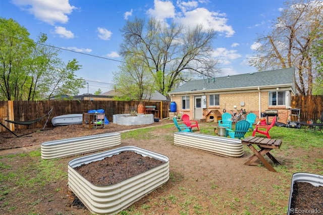 2870 Pontiac St, Denver, CO 80207 - fenced backyard with a vegetable garden