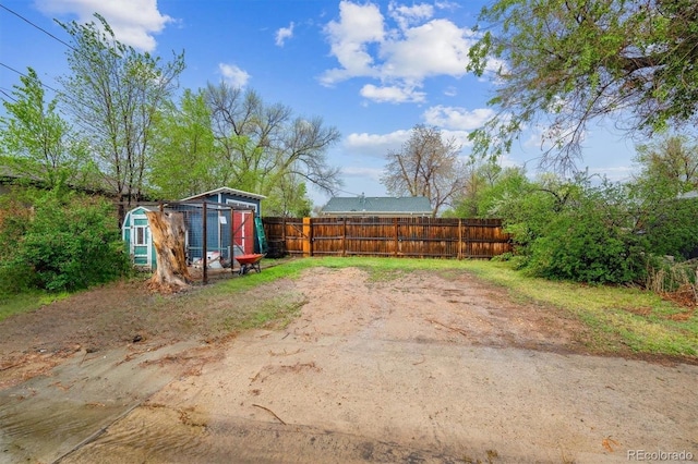 2870 Pontiac St, Denver, CO 80207 - view of yard featuring exterior structure and an outbuilding