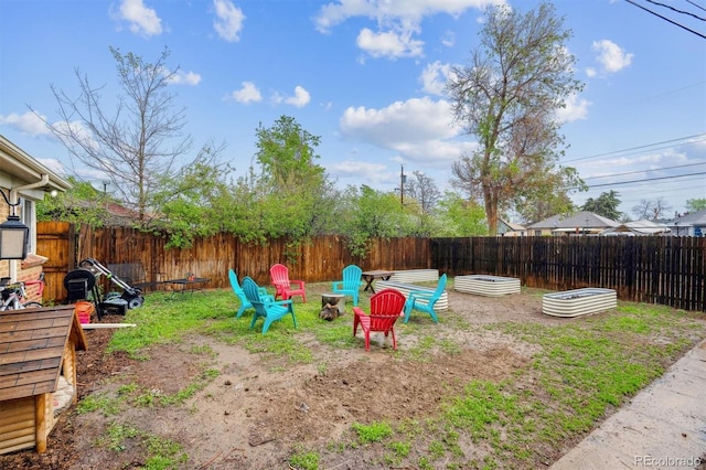 2870 Pontiac St, Denver, CO 80207 - fenced backyard with an outdoor fire pit
