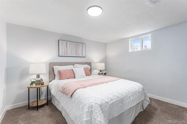 carpeted bedroom featuring baseboards