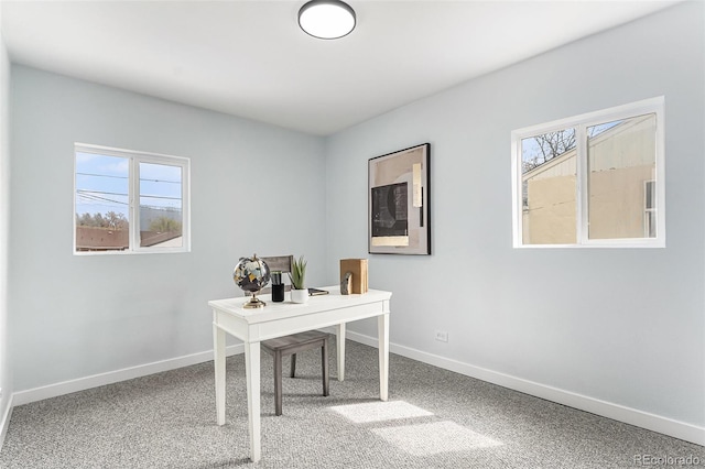 home office with baseboards and carpet flooring