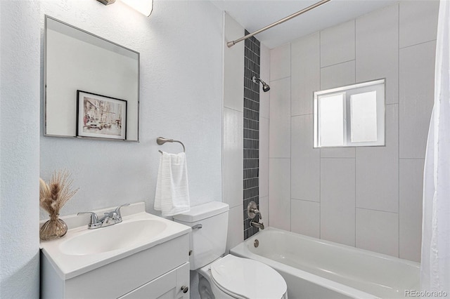 bathroom featuring shower / bath combination with curtain, toilet, and vanity