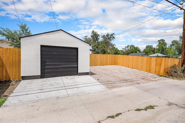 2 S Knox Ct, Denver, CO 80219 - detached garage with driveway