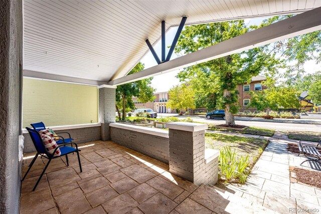 view of patio featuring covered porch