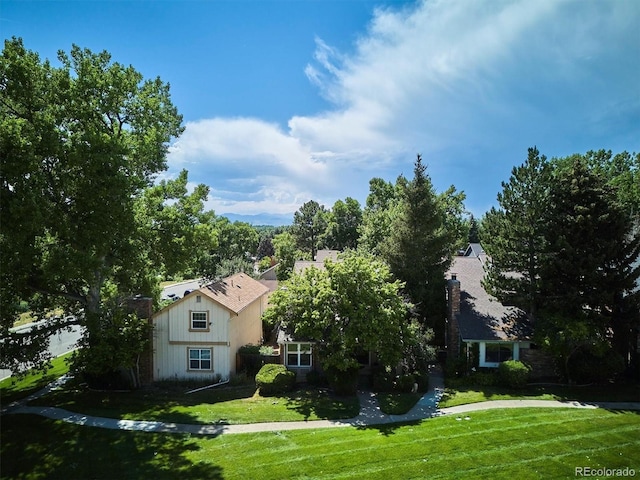 7713 E Jamison Dr, Centennial, CO 80112 - view of home's exterior featuring a yard