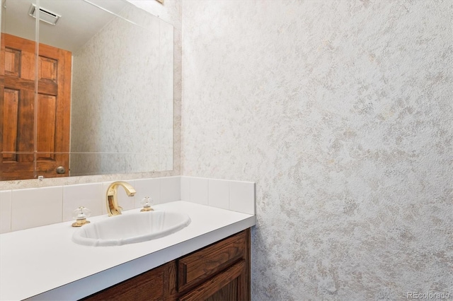 7713 E Jamison Dr, Centennial, CO 80112 - bathroom featuring vanity