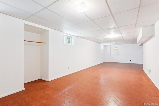 7713 E Jamison Dr, Centennial, CO 80112 - basement with a drop ceiling and tile patterned floors