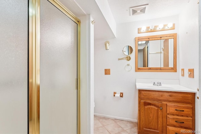 7713 E Jamison Dr, Centennial, CO 80112 - full bathroom with a stall shower, vanity, and tile patterned flooring
