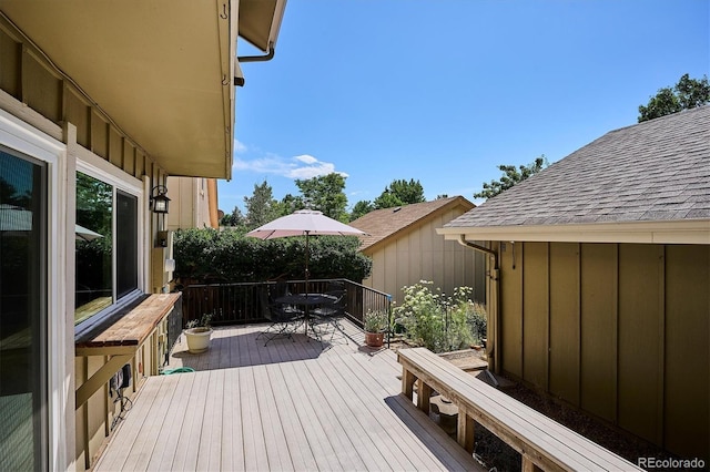 7713 E Jamison Dr, Centennial, CO 80112 - wooden terrace with outdoor dining area