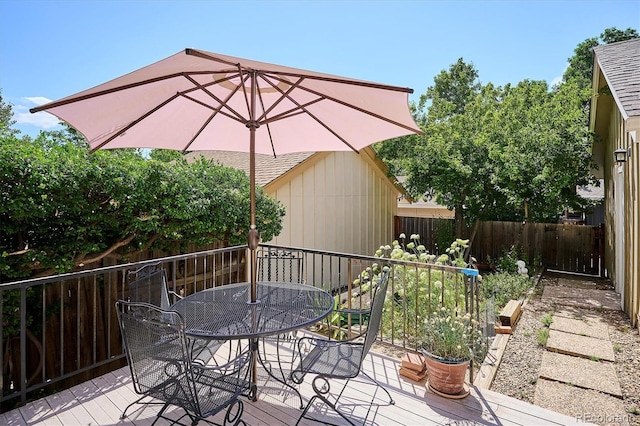 7713 E Jamison Dr, Centennial, CO 80112 - wooden terrace with outdoor dining area
