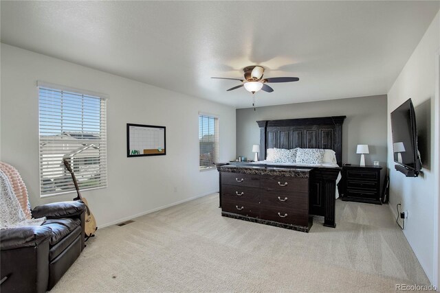 975 Alta St, Lochbuie, CO 80603 - bedroom with light carpet, baseboards, and a ceiling fan