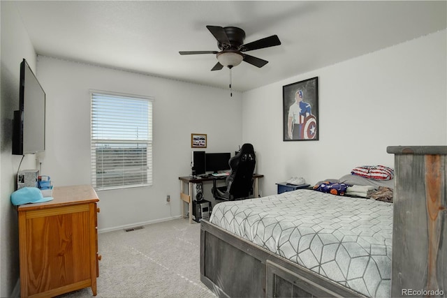 975 Alta St, Lochbuie, CO 80603 - bedroom featuring light carpet, a desk, baseboards, and a ceiling fan
