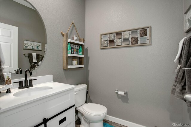 975 Alta St, Lochbuie, CO 80603 - bathroom with toilet and vanity