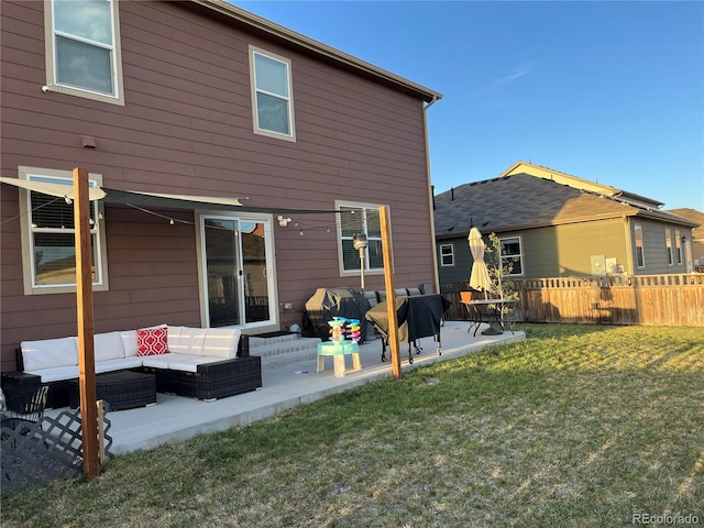 975 Alta St, Lochbuie, CO 80603 - rear view of house with a patio area and outdoor lounge area