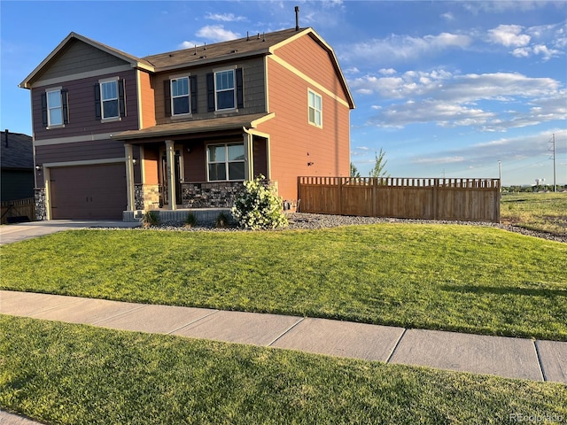 975 Alta St, Lochbuie, CO 80603 - view of front facade with an attached garage, driveway, a porch, and stone siding