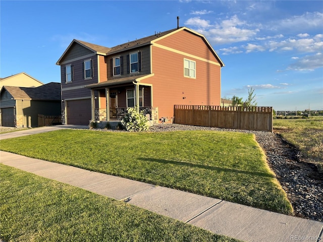 975 Alta St, Lochbuie, CO 80603 - view of front of home with concrete driveway, covered porch, a garage, and stone siding