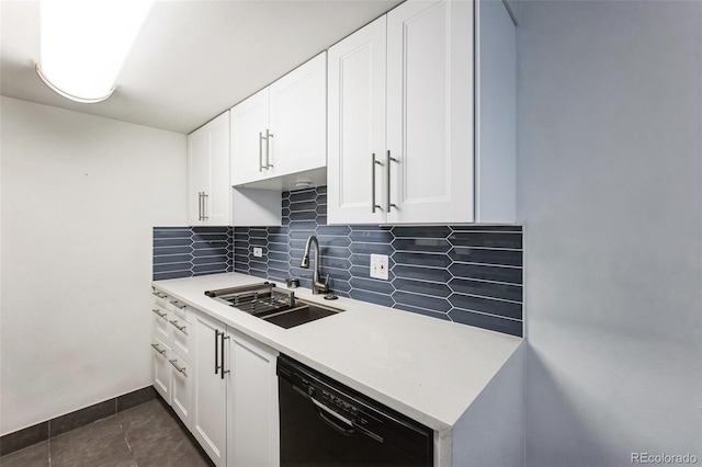 kitchen with a sink, white cabinetry, black dishwasher, light countertops, and decorative backsplash