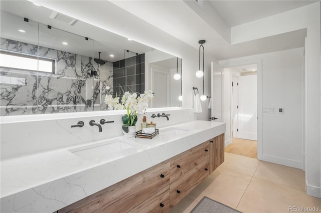 bathroom featuring tile patterned floors and vanity