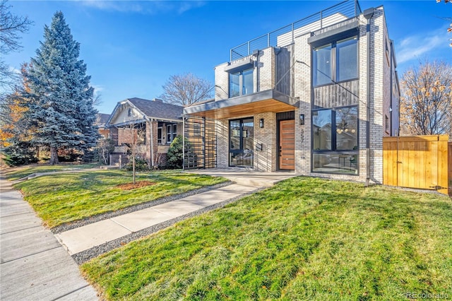 view of front of house with a front lawn