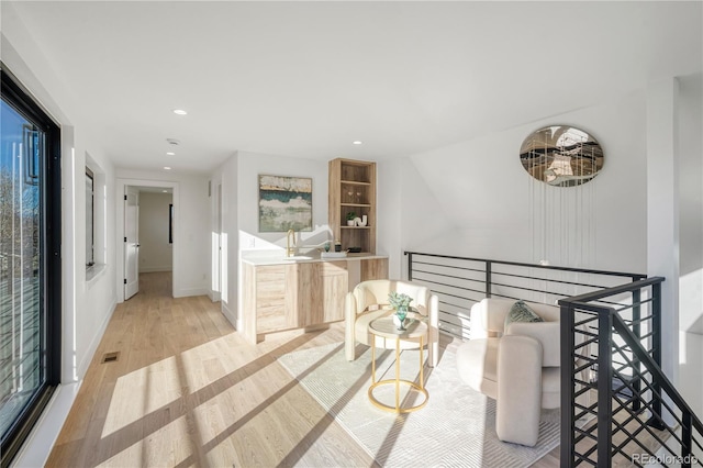 interior space with light hardwood / wood-style flooring