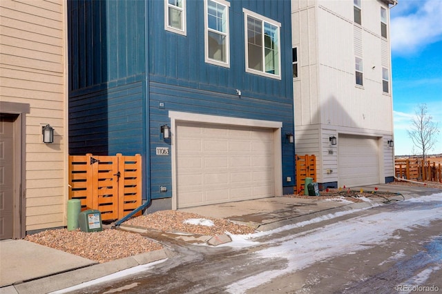 view of side of property with a garage