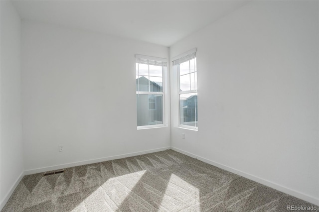 unfurnished room with carpet