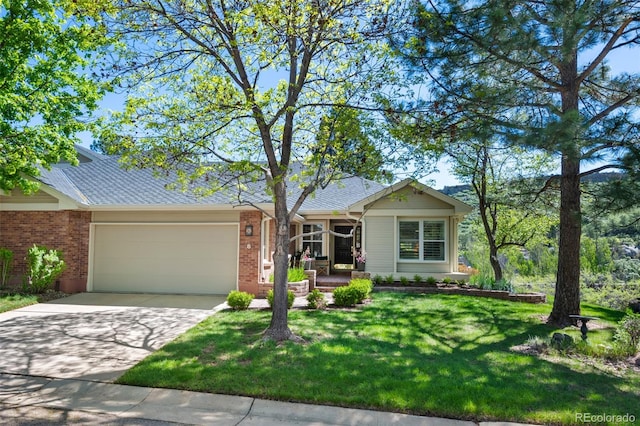 single story home featuring a front yard and a garage