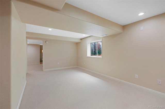 basement with carpet flooring