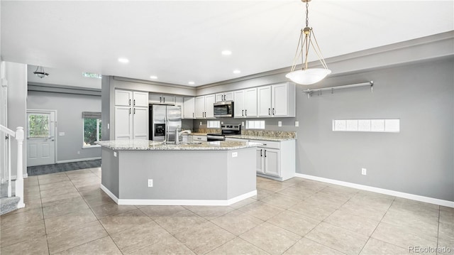 4458 Lyndenwood Pt, Highlands Ranch, CO 80130 - kitchen with stainless steel appliances, light tile patterned floors, light stone countertops, recessed lighting, and decorative light fixtures