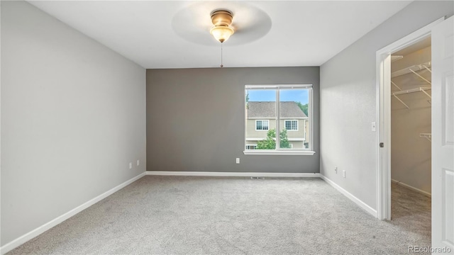 4458 Lyndenwood Pt, Highlands Ranch, CO 80130 - carpeted empty room featuring ceiling fan and baseboards