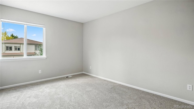 4458 Lyndenwood Pt, Highlands Ranch, CO 80130 - carpeted empty room featuring baseboards