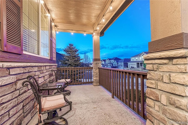 balcony featuring a residential view