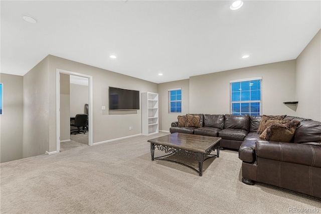 carpeted living room with baseboards and recessed lighting