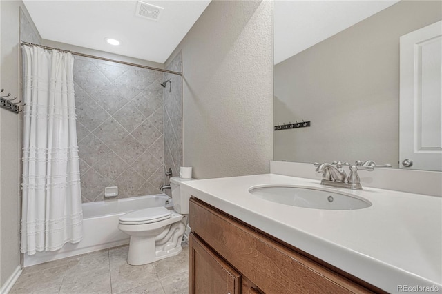 bathroom with vanity, shower / tub combo with curtain, toilet, visible vents, and recessed lighting