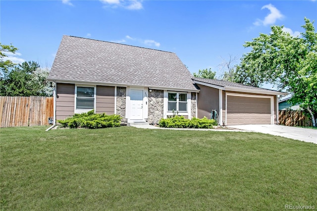 6579 Ingalls St, Arvada, CO 80003 - view of front of property featuring a garage, concrete driveway, stone siding, and a shingled roof