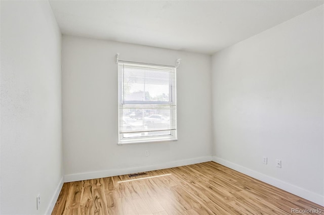 6579 Ingalls St, Arvada, CO 80003 - spare room featuring wood finished floors and baseboards
