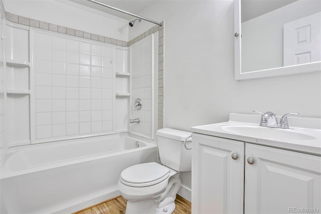 6579 Ingalls St, Arvada, CO 80003 - full bathroom featuring vanity, shower / tub combination, and wood finished floors