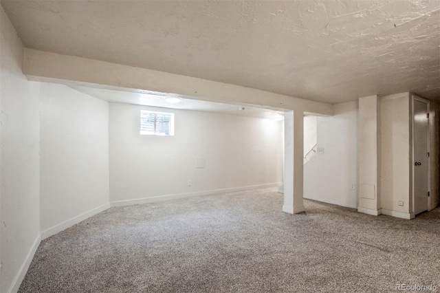 6579 Ingalls St, Arvada, CO 80003 - basement featuring carpet flooring and a textured ceiling