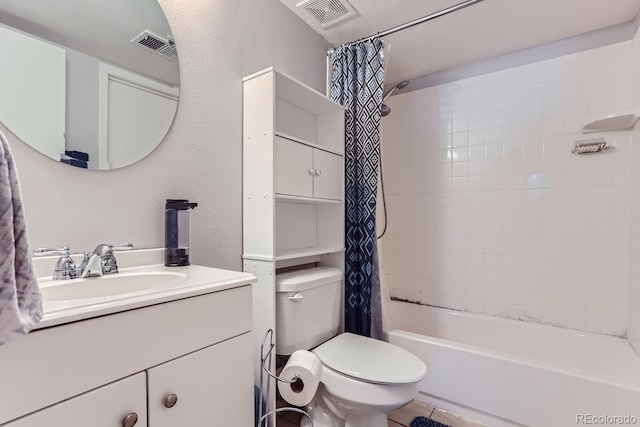 full bathroom featuring vanity, shower / tub combo with curtain, and toilet