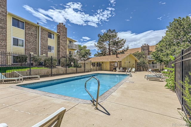 view of pool with a patio area