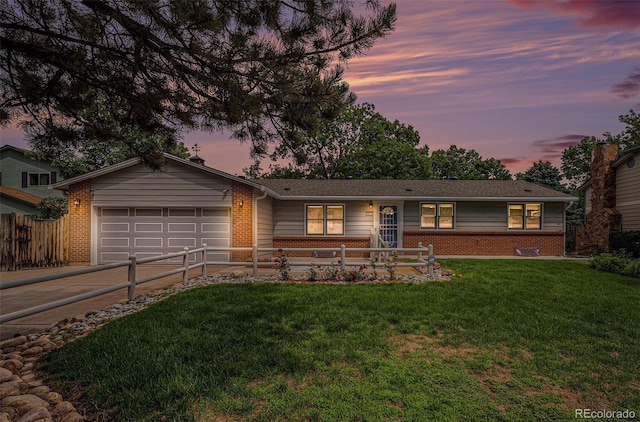 3272 S Joplin Ct, Aurora, CO 80013 - ranch-style house featuring brick siding, asphalt driveway, and a garage