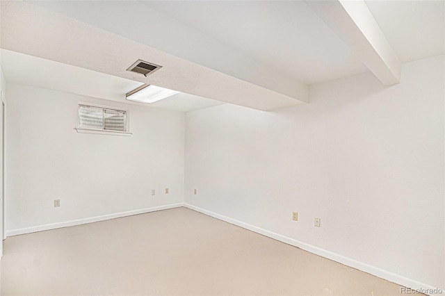3272 S Joplin Ct, Aurora, CO 80013 - spare room featuring baseboards and beamed ceiling